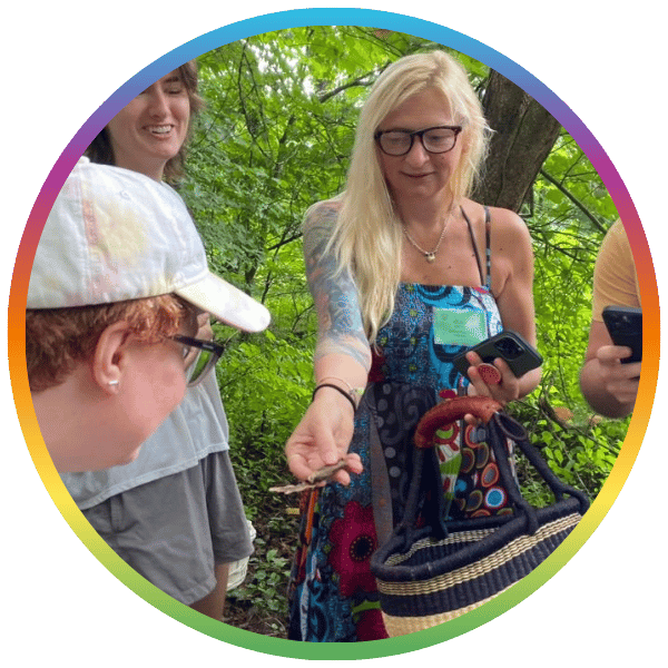 Olga Katic showing off a medicinal mushroom on the nature trail